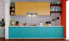 a kitchen with blue and yellow cabinets, orange walls and wooden floors is pictured in this image