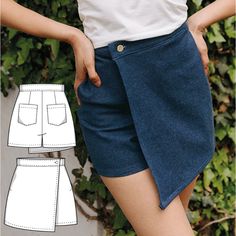 a woman's shorts with pockets and buttons on the side, next to a plant