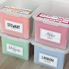 three plastic storage containers with labels on them