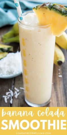 a banana cola smoothie in a glass with a straw