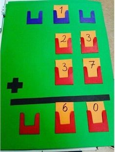 a piece of paper cut out to look like a game board with numbers on it