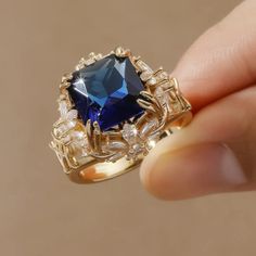 Beautiful Simulated Sapphire Gold Plated Ring.. Wow! Sizes Available: 7, 8 Blue Ring Jewelry For Party, Blue Party Ring Jewelry, Elegant Blue Crystal Ring For Parties, Elegant Blue Crystal Party Ring, Blue Crystal Ring For Party, Elegant Blue Crystal Ring Gift, Elegant Royal Blue Ring Jewelry, Blue Crystal Party Ring, Elegant Blue Crystal Gemstone Ring