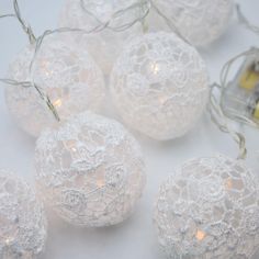 white lace ball lights are on the table