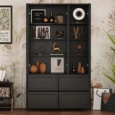 a black bookcase with many items on it