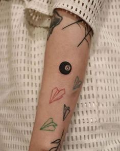 a person with a tattoo on their arm