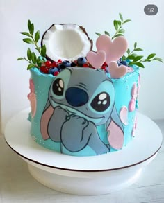 a cake decorated with an image of stitchy the stitcher from lilibu