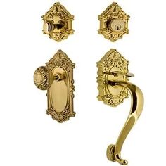 golden door handles and knobs with ornate designs on the front, back and sides