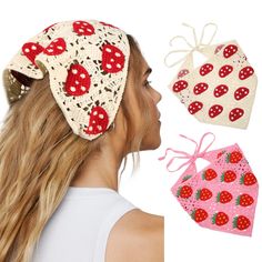 a woman wearing a hat with strawberries on it next to two pieces of fabric