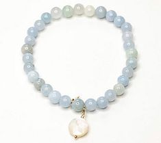 Bring a bit of color and shimmer to your wrist with this stretchy gemstone and 10K gold beaded bracelet. From Alkeme. Gold Beaded Bracelet, Bracelets Diy, Gold Bead Bracelets, Beaded Bracelets Diy, 10k Gold, Gold Beads, Diy Bracelets, Beaded Bracelet, Jewelry Bracelets