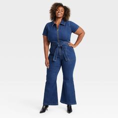 The Short-Sleeve Denim Jumpsuit from Ava & Viv™ makes a great pick for casual days. The short-sleeve denim jumpsuit is made of a midweight cotton-blend fabric with added spandex for comfortable all-day wear. The collared neckline and front half-length zipper closure lends ease of wear, while a tie closure at the waist lends a flattering fit. Side pockets complete the design with functional flair. Dark Denim Jumpsuit, Short Sleeve Denim Jumpsuit, Short Sleeve Denim, Cargo Jumpsuit, Personal Style Inspiration, Denim Jumpsuit, Womens Clothing Sizes, Universal Thread, Dark Denim