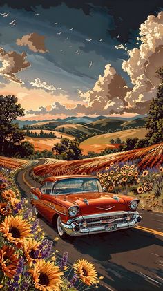 an old red car driving down a country road with sunflowers in the foreground