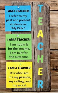 some colorful signs on a wooden fence with the words i am a teacher and i am a teacher