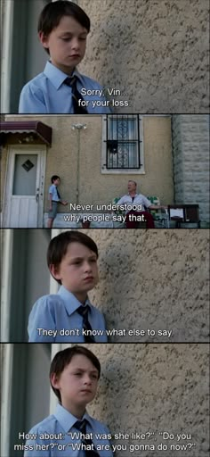 the boy in the blue shirt and tie is standing next to a wall with words on it