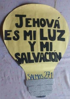 a yellow hot air balloon with the words jehova es mi luiz y salvaccion on it