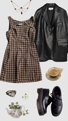 a woman's outfit and accessories are arranged in the shape of a dress, leather jacket, coffee cup, teacup, glasses, and necklace