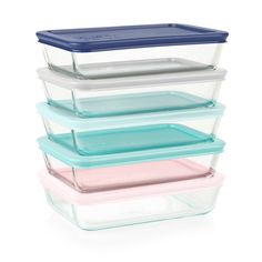 four glass containers stacked on top of each other