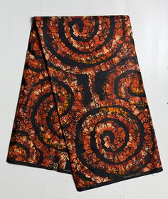 African  Ankara  Fabric  Per Yard or  6yards Material: 100% Cotton Print: Double - Sided Width:  45 - 46" Texture:  Lightly-Waxed Main colors: Black, Burnt Orange,  Beige FABRIC CUT: Purchase of  more than 1 yard,  will be cut as 1  continuous piece of fabric up to a maximum length of 6 yards.  MANUFACTURER's LABELS: All African fabric is sold with an adhesive Manufacturer label attached This timeless appeal & adorable, vibrant color African print fabric is perfect for making African Clothing, African Quilts, Upholstery, Home Décor, Unique Accessories and all types of Crafts and may have more colors than listed above Please be aware that  colors may appear slightly different due to your monitor's  settings. Lobola Dress, African Quilts, African Ankara, Unique Accessories, African Print Fabric, Ankara Fabric, African Food, Beige Fabric, African Fabric