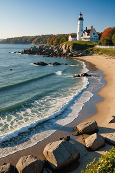 the beach is lined with large rocks and houses