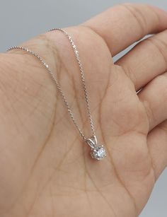 This is a beautiful Lab Grown diamond design pendant.  It is set in real solid 14Kt Gold and the chain is 14Kt Gold as well.  You can choose if you want 14Kt White Gold, 14Kt Yellow Gold or 14Kt Rose Gold.  We have a lot of beautiful jewelry with natural diamonds. If any listing states "diamond" then it is a natural diamond. If the listing states "Lab Grown" it is a Lab Grown diamond. The chain is attached to the diamond and sits comfortably on you when you wear it. This is the perfect gift for mom, wife, fiancee, girlfriend, valentine, daughter, family or friend. It is a special gift for mother's day, valentine's day, wedding, anniversary, birthday, Christmas, Easter, New Year's and any holiday. Clarity: SI2 Color: GH  Comes with 18 inch chain (If you need a longer or shorter chain contac 14k Gold Solitaire Necklace For Wedding, Silver Solitaire Necklace In 14k Gold For Wedding, Silver Solitaire Necklace In 14k Gold For Anniversary, Dazzling Diamond Cut Solitaire Pendant Necklace, Diamond White Solitaire Necklace With Pendant, Silver Diamond Necklace With Round Pendant In 14k Gold, Diamond Cut Solitaire Pendant Necklace For Anniversary, Silver 14k Gold Diamond Necklace With Prong Setting, Gift Diamond Solitaire Necklace With Diamond Cut