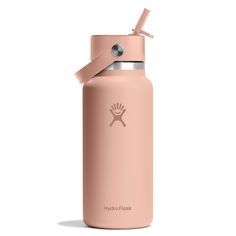 a pink hydro flask water bottle with a straw in it