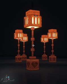 a group of lamps that are on top of each other in the dark night time