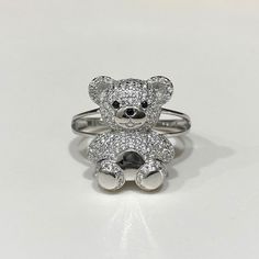 Sterling Silver Black Sapphire & White Topaz Bear, Teddy Bear Ring....Marked 925...Total of weights 4.6gramsMeasure of Face 17.9MM...It's in very good condition. Teddy Bear Ring, Bear Ring, Bear Teddy, Flower Band, Black Sapphire, Sterling Silver Flowers, Domed Ring, Silver Flowers, Ring Size 7