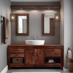 a bathroom with two sinks and mirrors on the wall