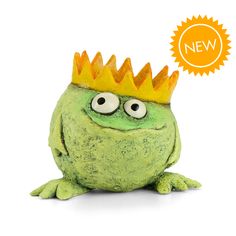 a green toy with a crown on it's head sitting in front of a white background