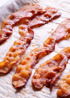 bacon on a baking sheet ready to be cooked