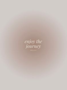 the words enjoy the journey in white on a gray background