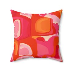 an orange and pink pillow on a white background with the word,'abstract art'in