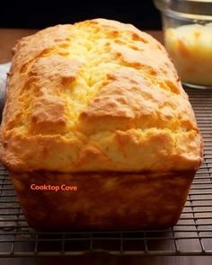 a loaf of bread sitting on top of a cooling rack