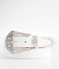 BKE Embossed Western Belt - White Medium, Women's White Distressed faux leather 1 1/2 belt. 100% Polyurethane.. WOMEN'S BELT SIZE CONVERSION CHART Jean Size 23-24 25-26 27-28 29-30 31-32 Belt Size XS S M L XL Belt Length** 34 37 40 43 46 *Conversion sizes may vary. **Measures from end to end excluding the buckle. These are general guidelines and sizing is dependent on belt being worn at natural waistline or the hip. Apparel & Accessories Silver Belt Buckles For Western-themed Events, Western Style Silver Belt Buckle, Luxury Silver Western Belt, Western Silver Belt With Buckle Closure, Silver Antique Buckle Belt For Western-themed Events, Western Belts, Belt Size, Belts For Women, Emboss