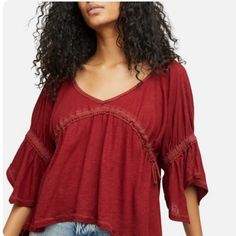 Free People Sand Storm Top In Sanquine Size Small Brand New With Tags Brand New With Tags Free People Red Top Sand Storm Top Color: Sanquine V-Neckline 3/4 Sleeve Pullover Style Drawstrings Detail ( Missing 1 Drawstring On Back ) Handkerchief Hem Sz Small Burgundy V-neck Top For Summer, Burgundy V-neck Summer Top, Summer Burgundy V-neck Top, Red Vacation Top For Fall, Burgundy V-neck Blouse For Summer, Bohemian Burgundy Tops For Spring, Bohemian Burgundy Top For Spring, Red Casual Top For Brunch, Casual Red Top For Brunch