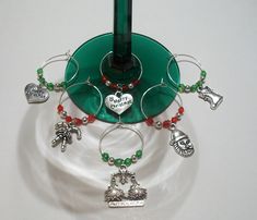 a wine glass holder with charms on it