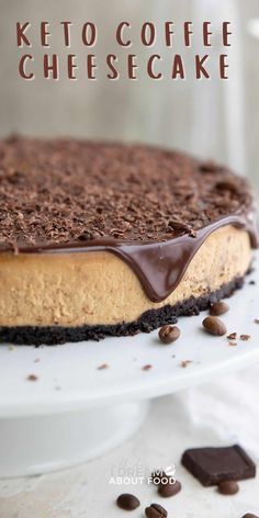 a close up of a cake on a plate with chocolate chips around it and the words keto coffee cheesecake