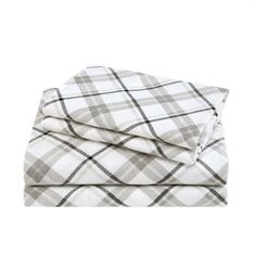 two blankets folded on top of each other in grey and white plaid pattern, with one blanket