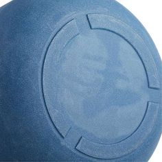 a blue frisbee with a circular design on the front and center part of it