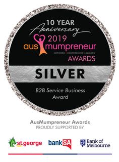 silver award badge with the words, 10 year anniversary and an image of a woman's breast