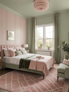 a pink and green bedroom with a bed, chair, window and rug on the floor