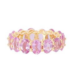 This eternity ring from Shay Jewelry is a romantic addition to your fine jewelry collection. It's crafted from 18kt yellow gold with riveting oval-cut pink sapphires that are set in an open shared prong setting. Luxury Gold Rings With Pink Sapphire, Luxury Pink Sapphire Eternity Band For Engagement, Pink Eternity Band Fine Jewelry, Luxury Pink Sapphire Eternity Band, Luxury Pink Multi-stone Sapphire Ring, Rose Gold Eternity Ring, Shay Jewelry, Gold Eternity Ring, Pink Stone Rings