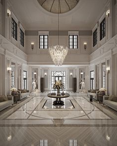 an elegant lobby with chandelier and marble floors