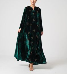 Peacock Green with embroidery Velvet one piece kaftan Featuring an Peacock Green with embroidery Velvet one piece kaftan with handcrafted as and wherever is required of zardosi, cutdana, resham, sequins,dabka embroidery, floral butti & scallop motif embellishment & gota work.  For collection visit --  https://www.indberry.com This product will be shipped to you after 1-2 weeks from the date of order placed. All custom made orders are not returnable. Pls contact for Size chart and for other more colors Request You :To provide contact details for courier services. {VARIATION MAY COME ,IF ANY LACES OR GOTTA PATI or TUSSELS IS USED } NOTE:  1) Visual Samples on website may differ slightly from actual product due to light & effects during photography (Length & Breadth have 1 n 1.5 inches +/-). Velvet One Piece, Dabka Embroidery, Green Kaftan, Gota Work, Embroidery Floral, Peacock Green, Light Effect, Color Patterns, Custom Made