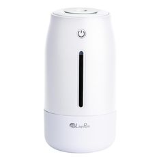 a white air purifier sitting on top of a table