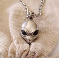 ★ Alien Head Pendant ★  Handcrafted Alien (Grey) Head pendant/necklace for Men and Women. * Material/Finishes ➤ Artificially Aged (Black/Grey Oxidized) Matte Silver 925 * Dimensions ➤ ~ 2.6 x 2.1 x 1.8 cm (~ 1.0 x 0.8 x 0.7 inches)/Bail: Suitable for up to ~ 4.5mm (~ 0.18 inches) Chain * Weight: ~ 12 grams (in Silver 925) ----------------------------------------------------------------------------- IMPORTANT NOTES: ----------------------------------------------------------------------------- ➤ W Ufo Jewelry, Material Finishes, Alien Necklace, Alien Head, Precious Jewels, Stainless Steel Chain, Men Necklace, Silver 925, Silver Color