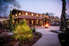 a large house with christmas lights on it