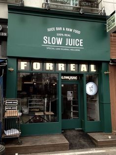 the front of a restaurant called slow juice