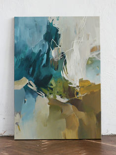 an abstract painting is displayed on the wall