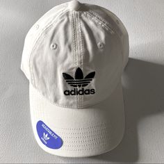 Adidas Men's Originals Relaxed Strapback Cap Hat - White W Black Trefoil (Nwt) Casual Adidas Hat With Logo, Casual Adidas Hat, Casual Adidas Hat With Curved Visor, Adidas Logo Hat With Curved Visor For Streetwear, Adidas Logo Adjustable Snapback Baseball Cap, Adidas Logo Snapback Baseball Cap, Casual Adidas Logo Cap, Casual Adidas Snapback Hat, Casual Adidas Logo Hat For Streetwear