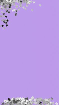 a purple background with silver stars and confetti on the bottom right corner is an empty space for text